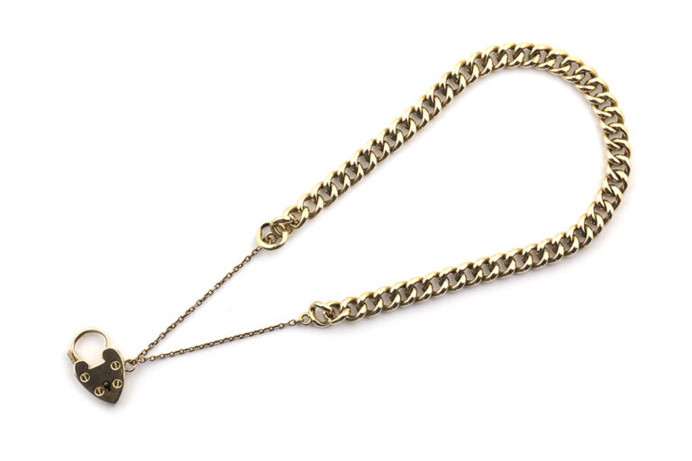 Curb Link Bracelet with Padlock Style Fastener 9ct gold.