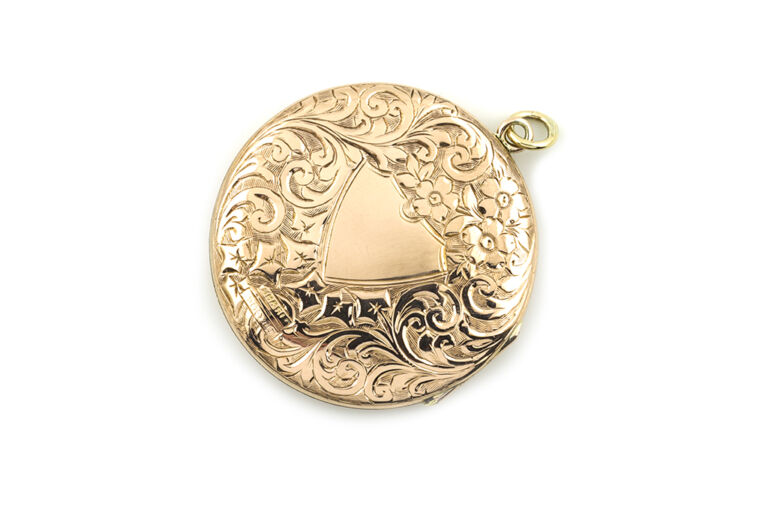 Scroll Engraved Opening Hinged Locket 9ct gold.