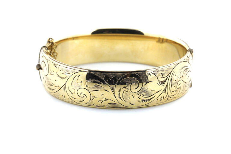 Rolled gold hinged bangle