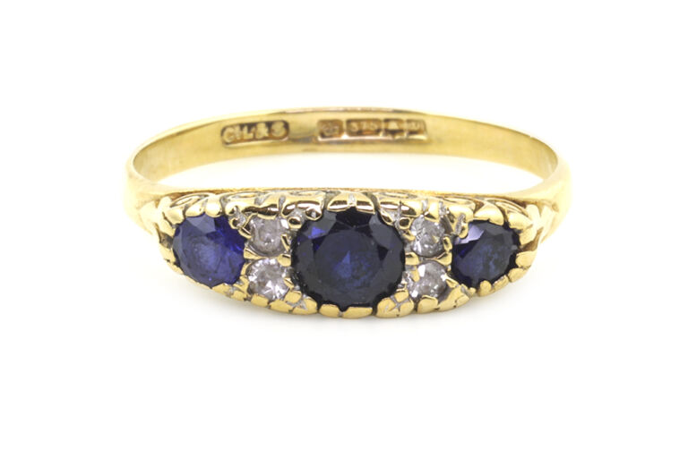 Synthetic Sapphire & Cubic Zirconia 7 Stone Ring 9ct gold Size P