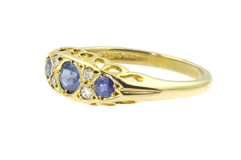 Blue Sapphire & Diamond 7 Stone Ring 9ct yellow gold Size O