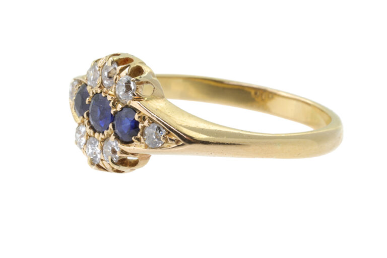 Blue Sapphire & Diamond Cluster 18ct gold Size R.