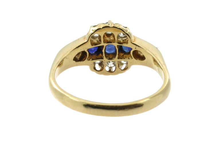 Blue Sapphire & Diamond Cluster 18ct gold Size R.